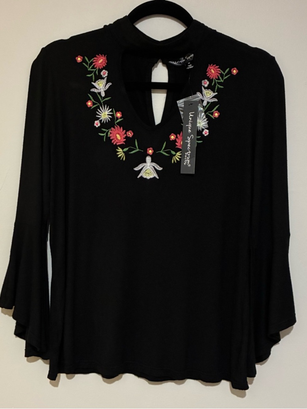 Unique Spectrum Black Bell Long-Sleeve Keyhole Neck Top with Floral Embroidery